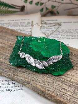 Carved Leaf Necklace With White Topaz